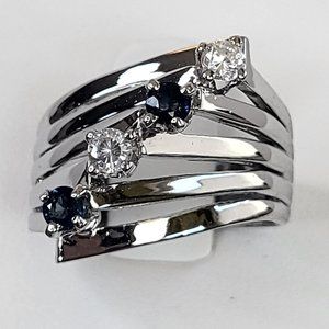 *4/$20* Silver tone ring with blue and clear stones size about 6.5 or 6.75
